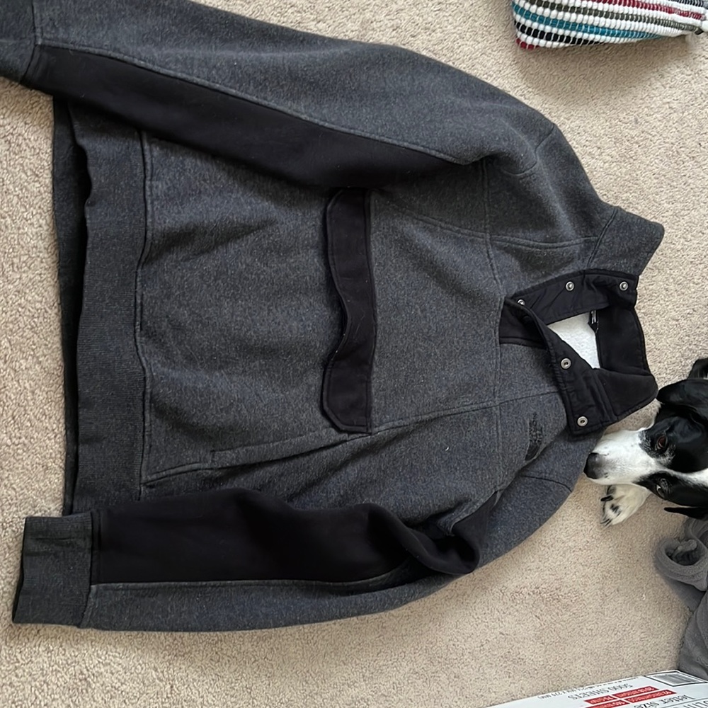 Grey and black Northface pull over